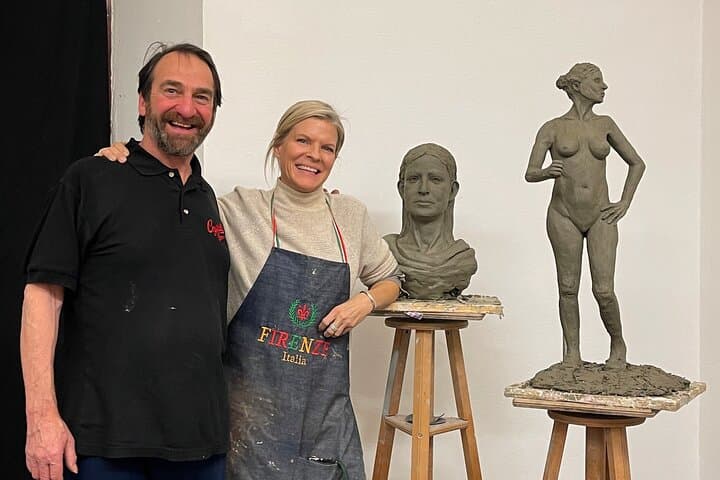 Frank with a student and her figure and portrait works.