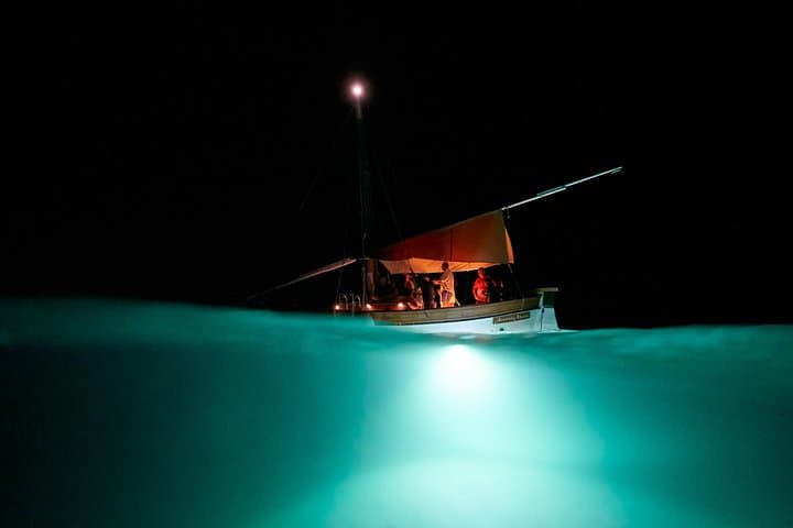 Sailing ship at night