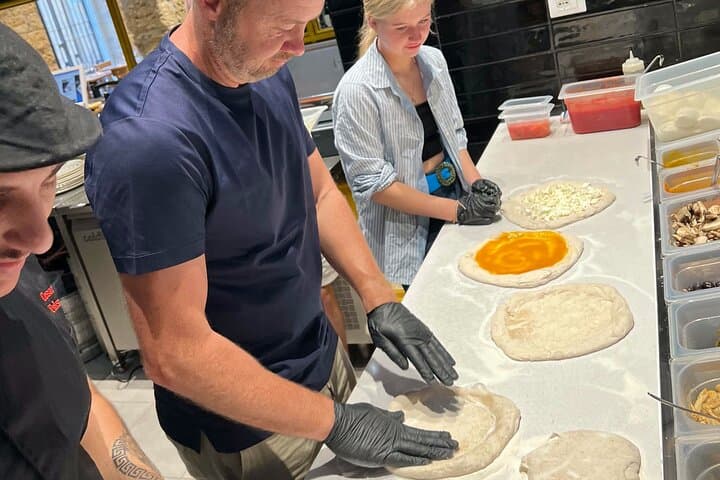 Pizza cooking class in real Pizzeria with Pizza chef & Tour guide