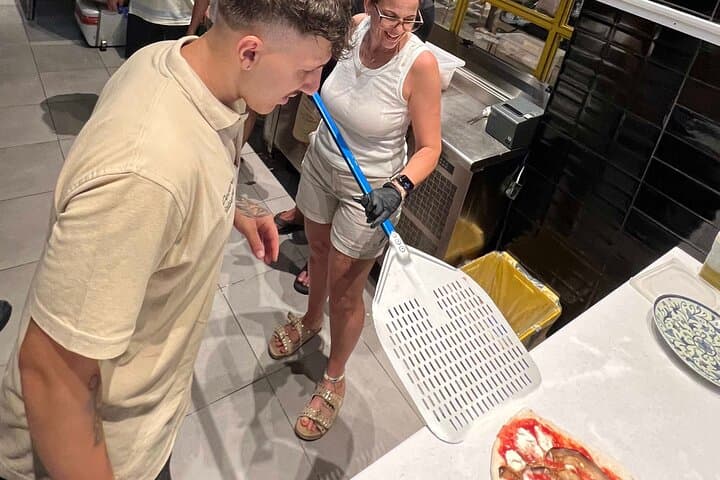 Pizza cooking class in real Pizzeria with Pizza chef & Tour guide