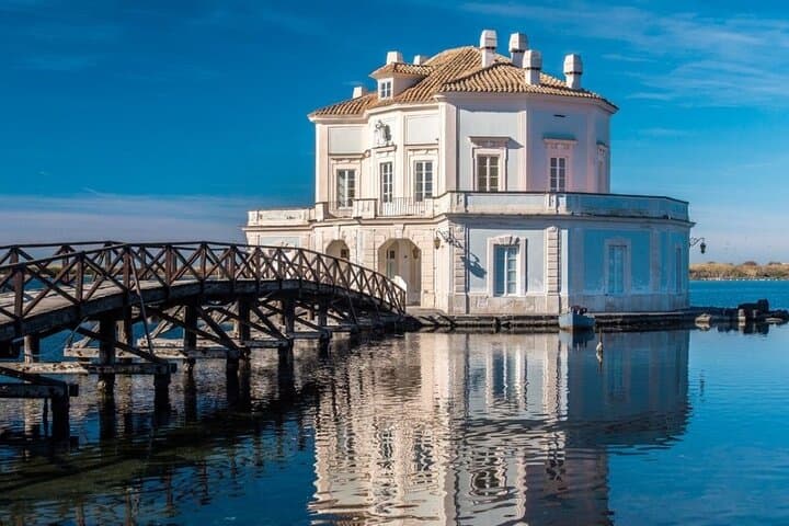 The splendid and fairy-tale Casina Vanvitelliana, hunting residence of the Bourbons.