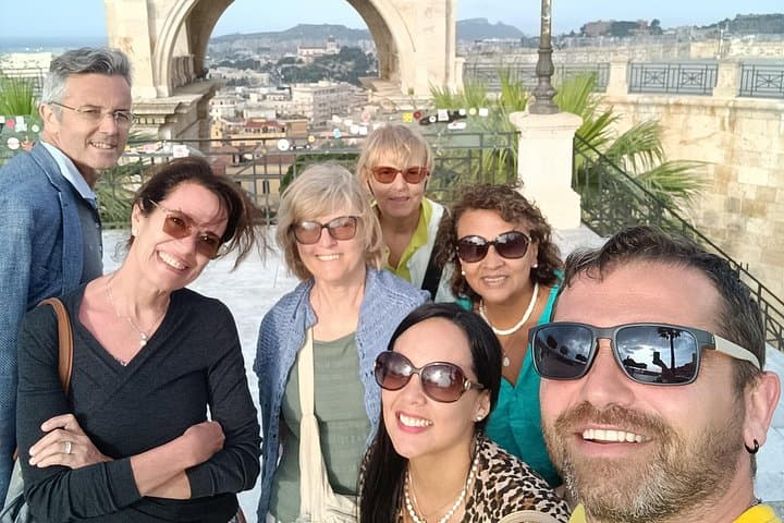 Cagliari city tour and flamingo park by minivan and on foot