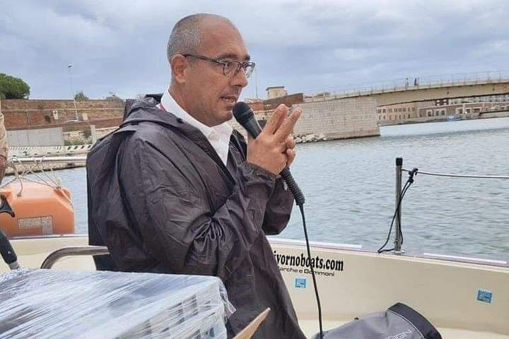 Pierino speaking on the tour boat