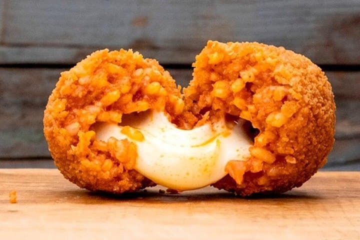 The original suppli that you can eat only in Rome. A tasty fried rice ball with tomato and mozzarella