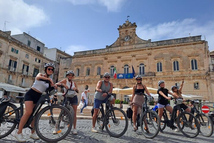 E-bike tour in Ostuni, the olive trees and the rock village