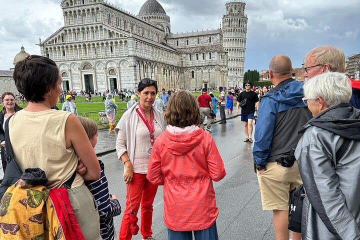 The guide showing the Cathedral and the Tower to our guests
