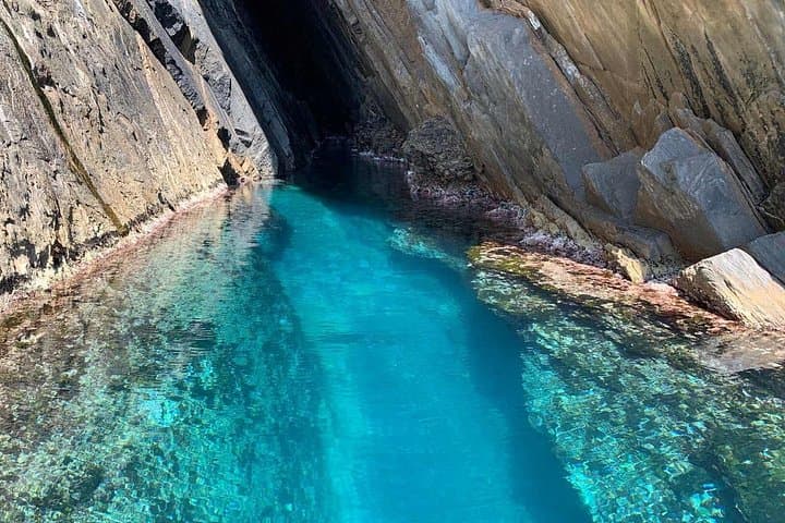 Rubber dinghy tour in Buggerru in southern Sardinia