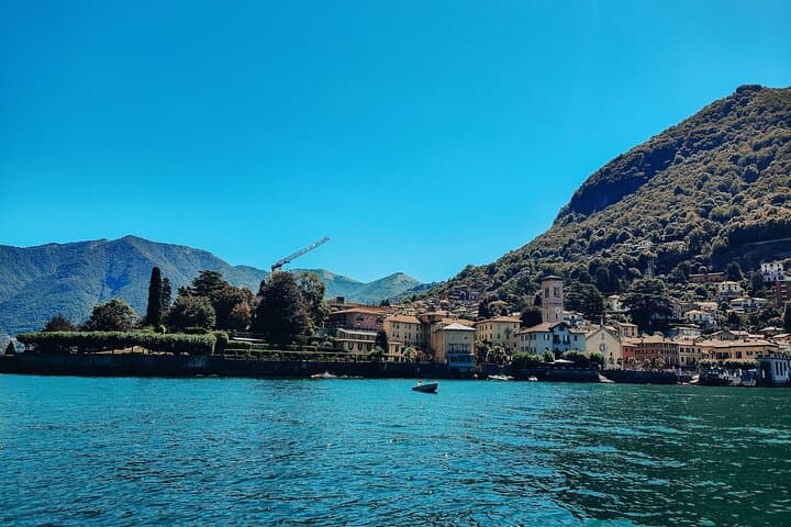 The crystal-clear water beneath us reflects the azure sky, creating an atmosphere of pure magic.
