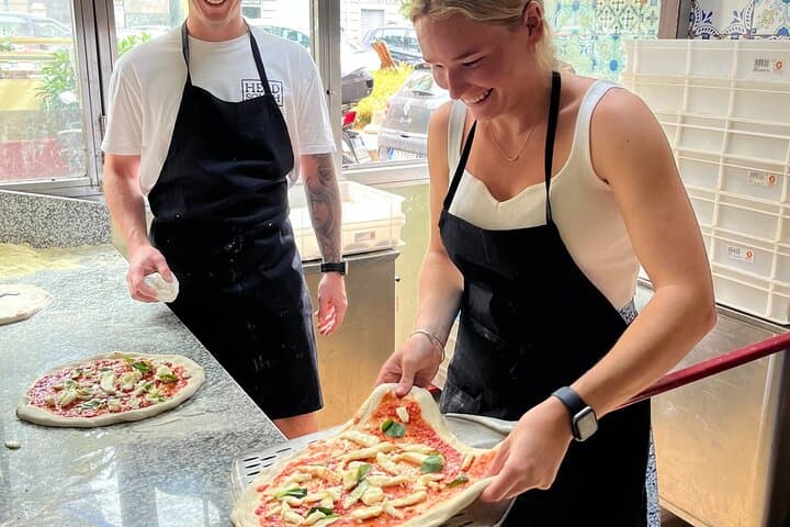 Become a real pizzaiuolo for a day in a real , authentic Pizzeria in the hearth of Naples