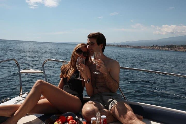 Boat tour in Taormina, susent aperitif, dolphin watching