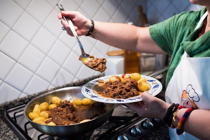 Typical Dining & Cooking Demo at Local's Home in Lucca