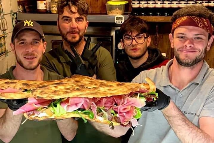 Giant snack ( cicchetti) found in Venice. One of the options of stops on the tour. Food tour in Venice, and some wine too.