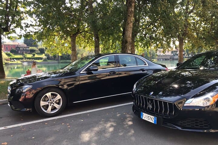 Milan Malpensa airport transfer to Como City Transfer sedan car