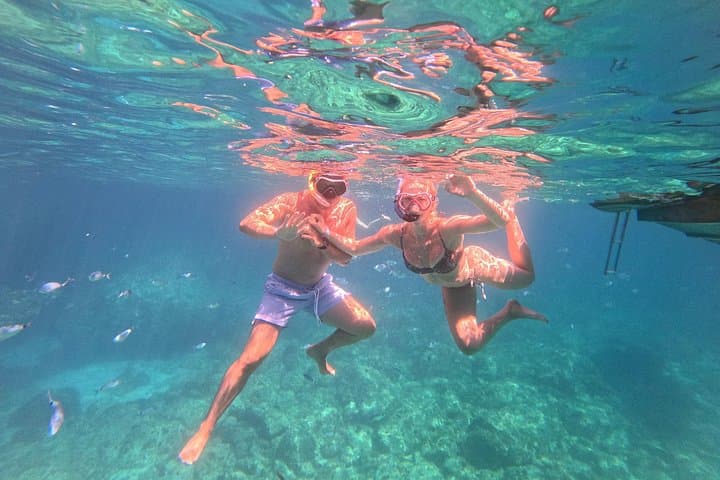 Boat tour with snorkeling and small aperitif in Alghero