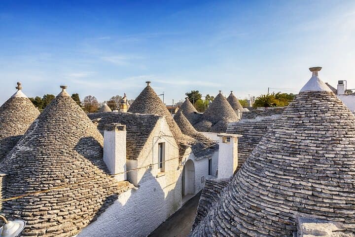 Polignano Alberobello and Locorotondo with transfer from Matera
