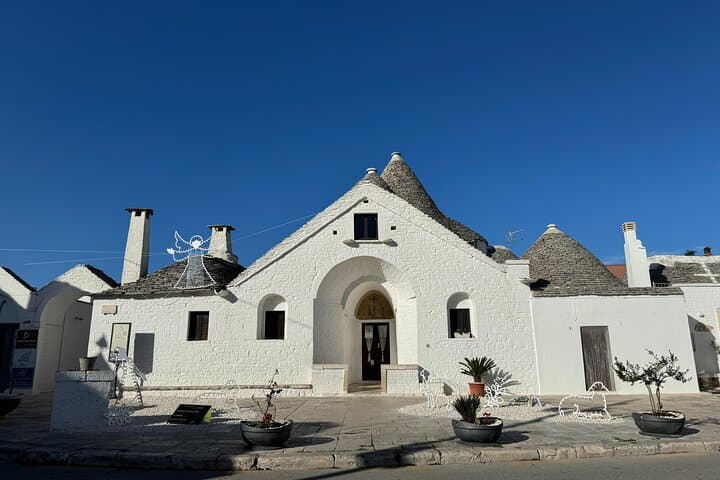 Polignano Alberobello and Locorotondo with transfer from Matera