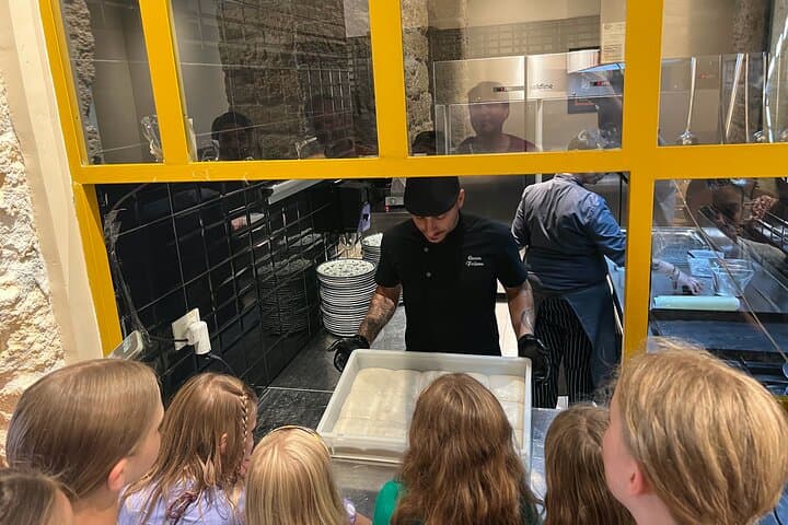 Pizza cooking class in real Pizzeria with Pizza chef & Tour guide