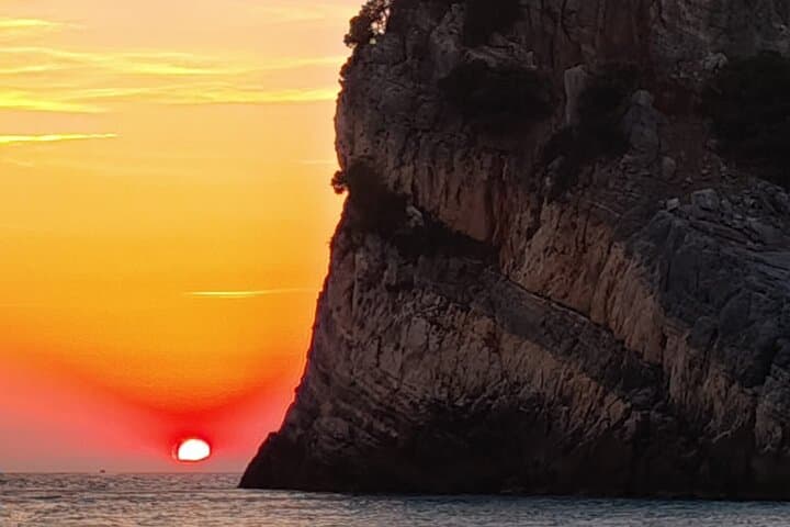 Aperitif on a boat at sunset, Porto Venere and islands