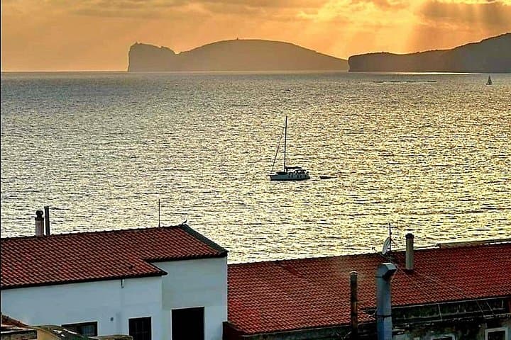 Aperiboat at sunset