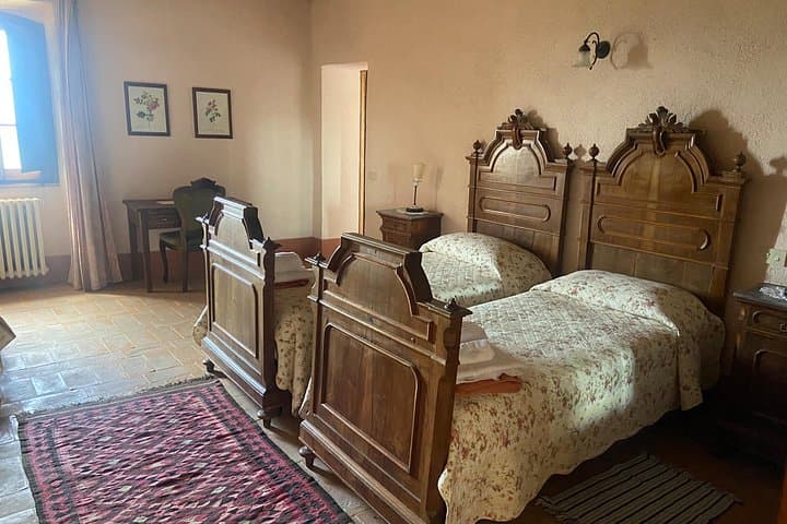 Spacious bedrooms with antiques and typical furniture
