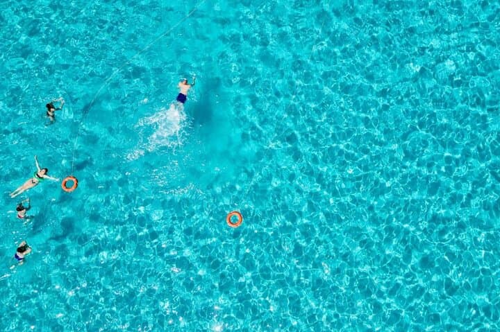 From Stintino: 3-hour catamaran tour with aperitif off La Pelosa
