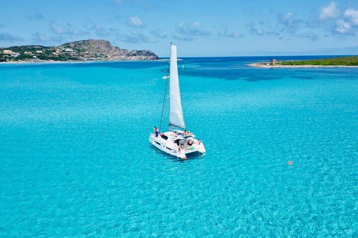 From Stintino: 3-hour catamaran tour with aperitif off La Pelosa