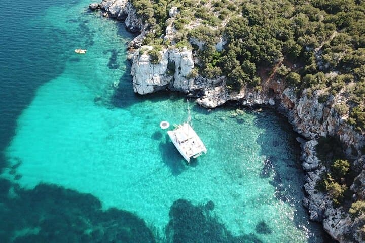 Porto Conte Half-day catamaran tour with aperitif