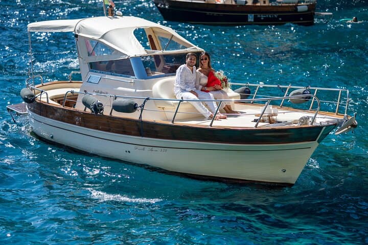 Three Hour Private Guided Tour of Capri with a luxury Gozzo cabin cruiser