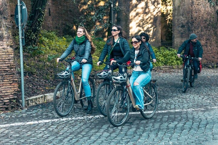 E-biking through history! ️ This group is taking in the ancient beauty of the Appian Way near Porta San Sebastiano with Rome in a Day Tours!