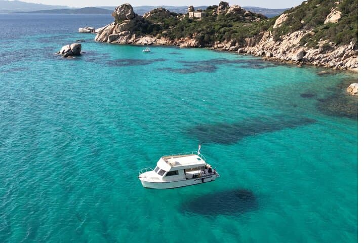 Then we reach a seductive cove, sheltered by wind and waves