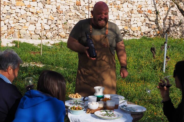 Picnic aperitif in the vineyard of an ancient trullo in Martina Franca