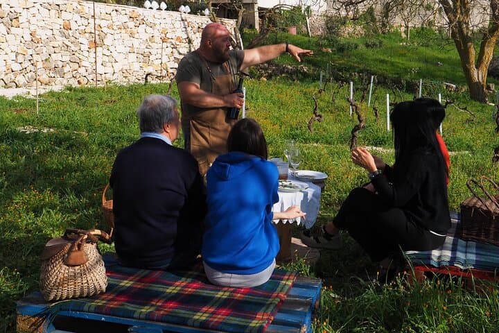 Picnic aperitif in the vineyard of an ancient trullo in Martina Franca