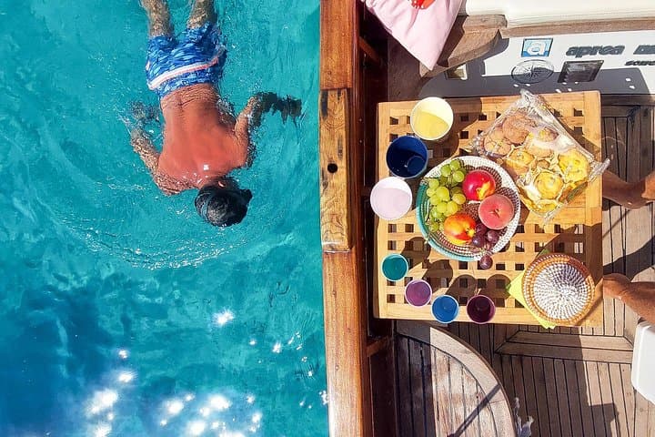 coffee, Sardinian desserts, fresh fruit on board