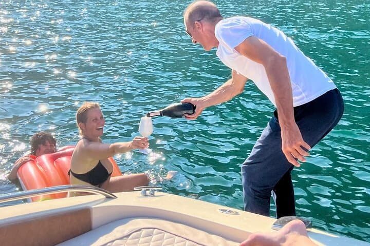 Full Day Private Lake Como Speedboat Tour with drinks & Swimming