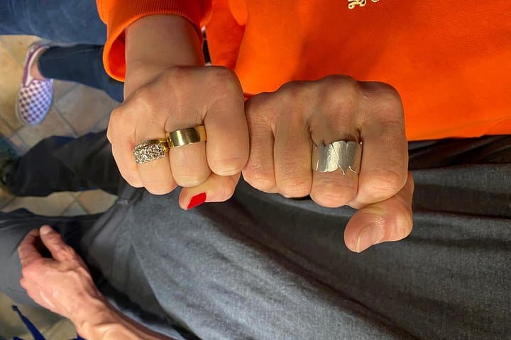 A chunky gold ring and a gingko ring