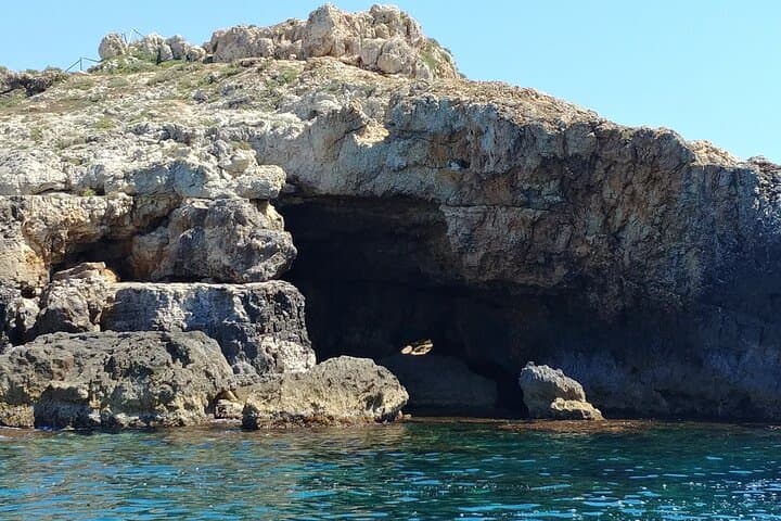 The charming and legendary Devil's Cave, a very large cave that can only be accessed by land despite its outlets to the sea.