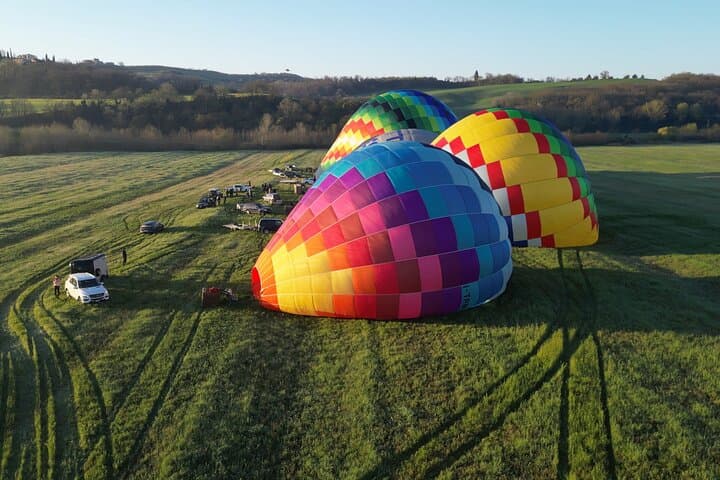Watch the colorful balloons come to life as the sun rises.