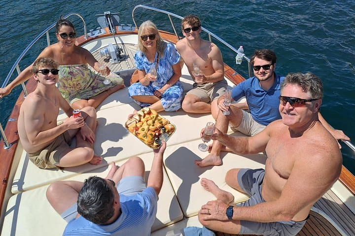 2H Private Cruise on a beautiful wooden speedboat on Lake Como