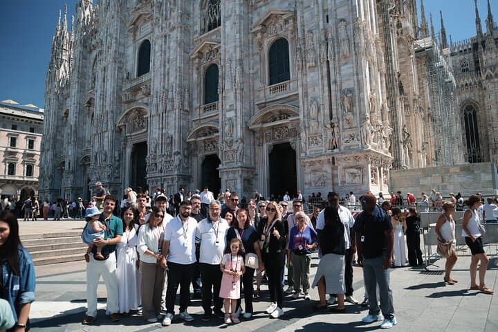 happy travelers in front of Duomo