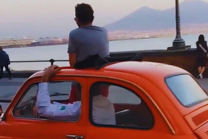 "Hop in a Fiat 500 and cruise through Naples' historic streets!