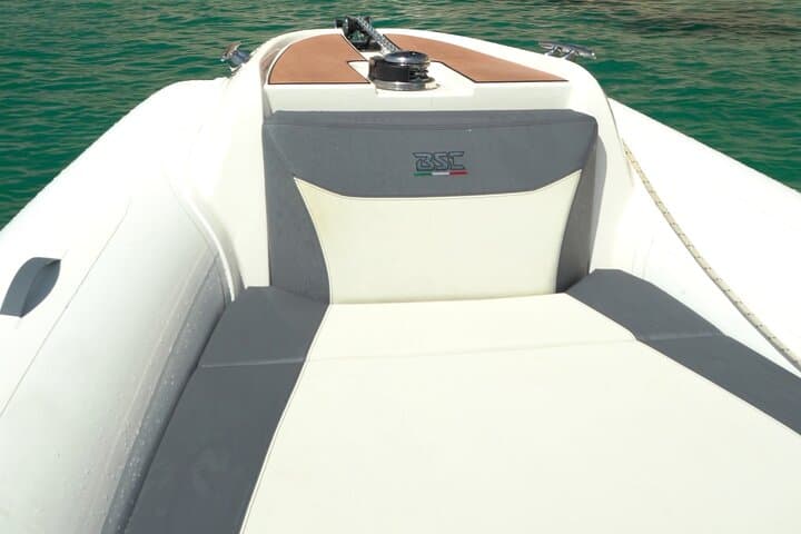 Stretch out and relax on elegant, spacious sunbeds — the comfort of a premium boat, all to yourself.