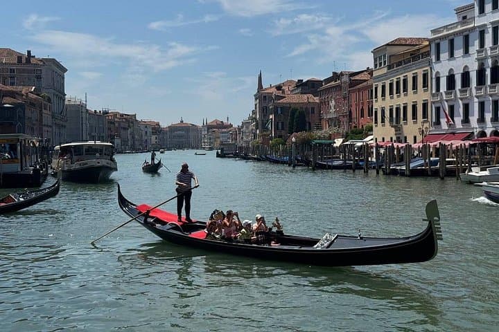 The single Gondola rider in Grand Canal
