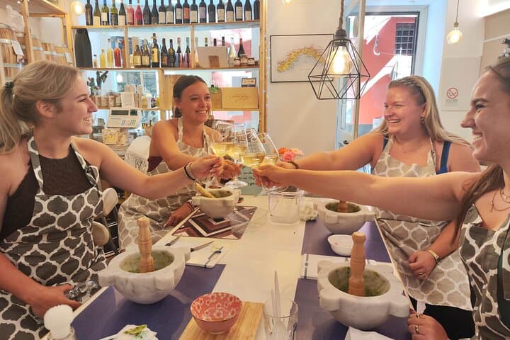 Sharing a joyful moment while making fresh pesto together