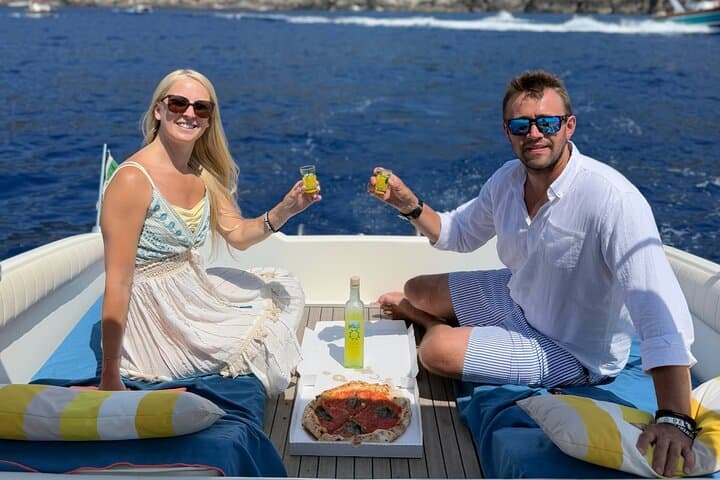 Private Capri Boat Tour: Blue Grotto, Faraglioni, & Swim Stops