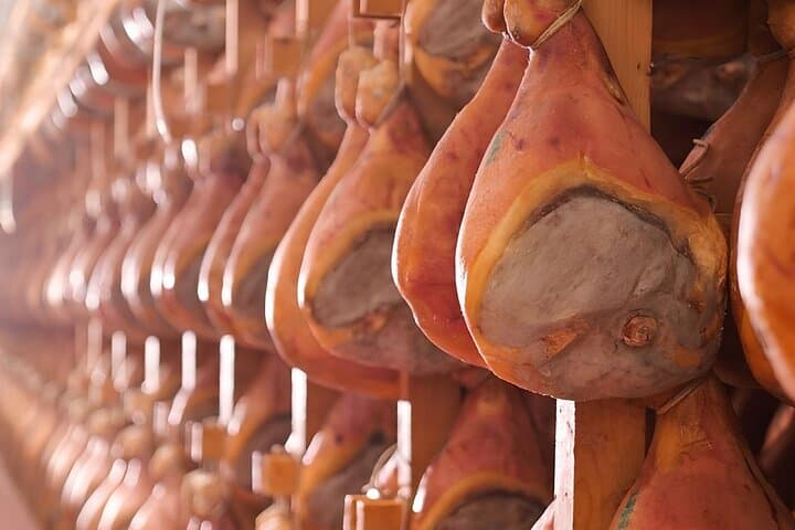 From Reggio Emilia Mediopadana Tour of Parmigiano and Parmaham
