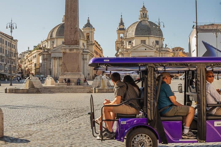From the comfort of your golf cart, admire the sweeping beauty of Piazza del Popolo and its timeless symmetry.