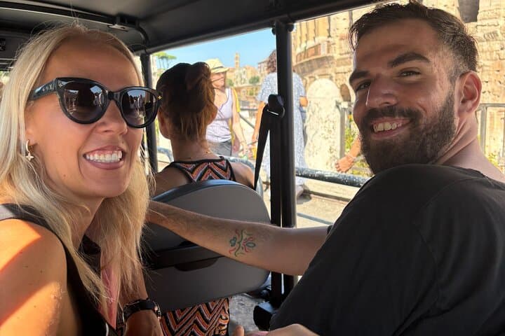 All you need to hop on a golf cart with us? A big smile!