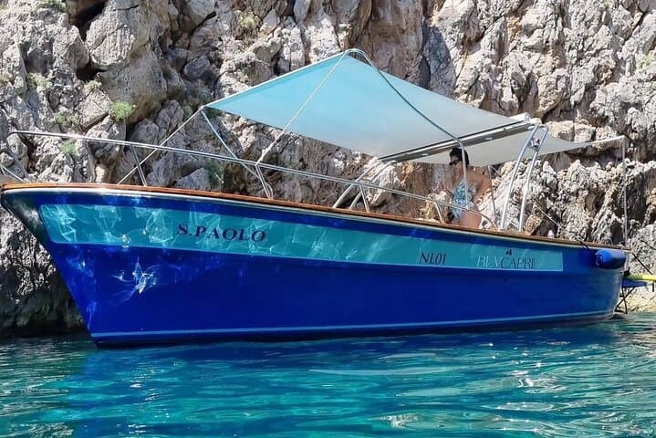 Private Gozzo Boat Tour of Capri with Swim and Local Delicacies