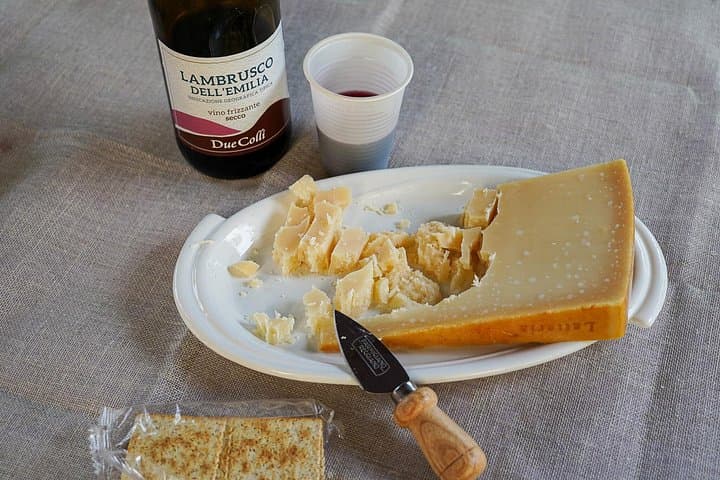 From Bologna: Parma, Parmesan and Ham Tour by Train 1st Class