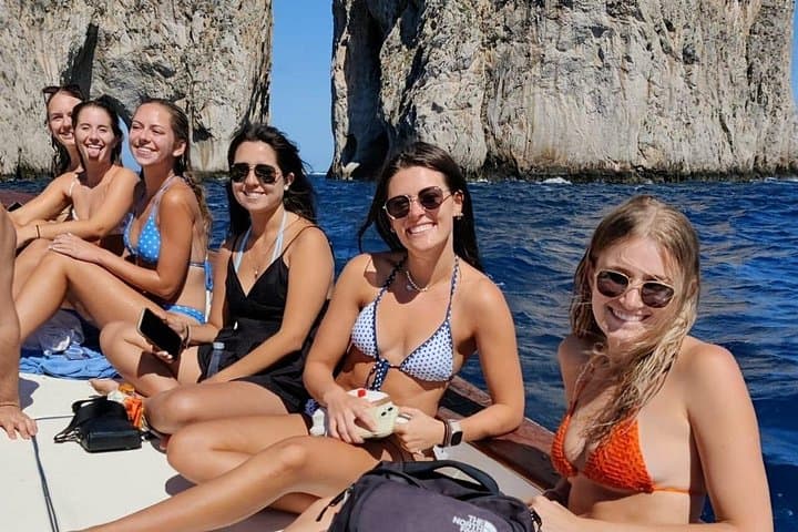 Scenic Capri Boat Tour: Sea Caves, Swimming, Snack and Limoncello